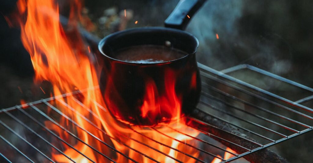 キャンプの調理中に火がつかず困っている家族